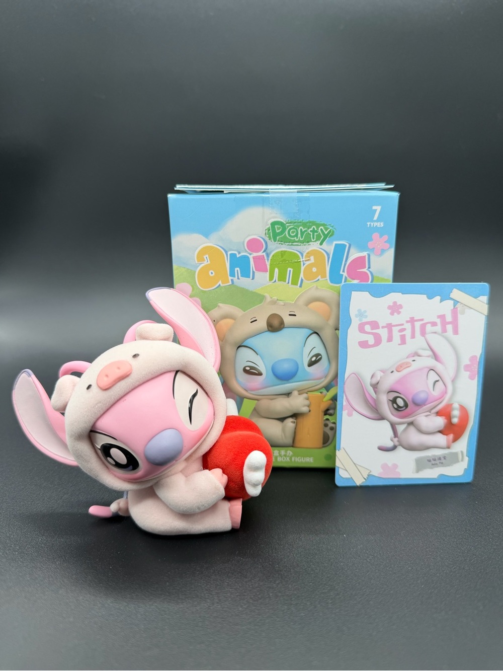 Pink Stitch-Inspired Plush Figure with Red Heart